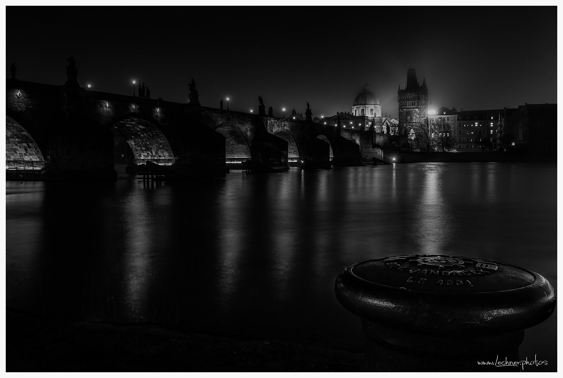Charles Bridge Prague during a foggy night
